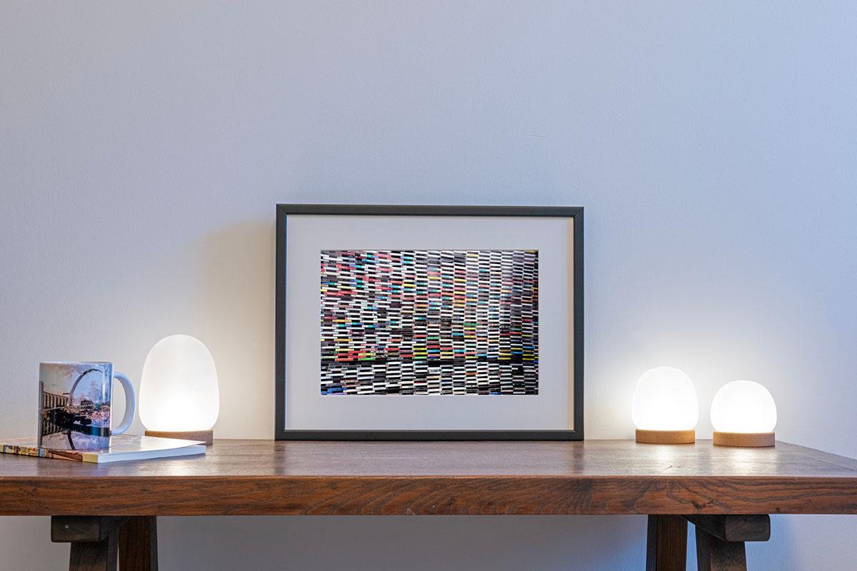 Wall of Sound cassette tapes print in small frame on table