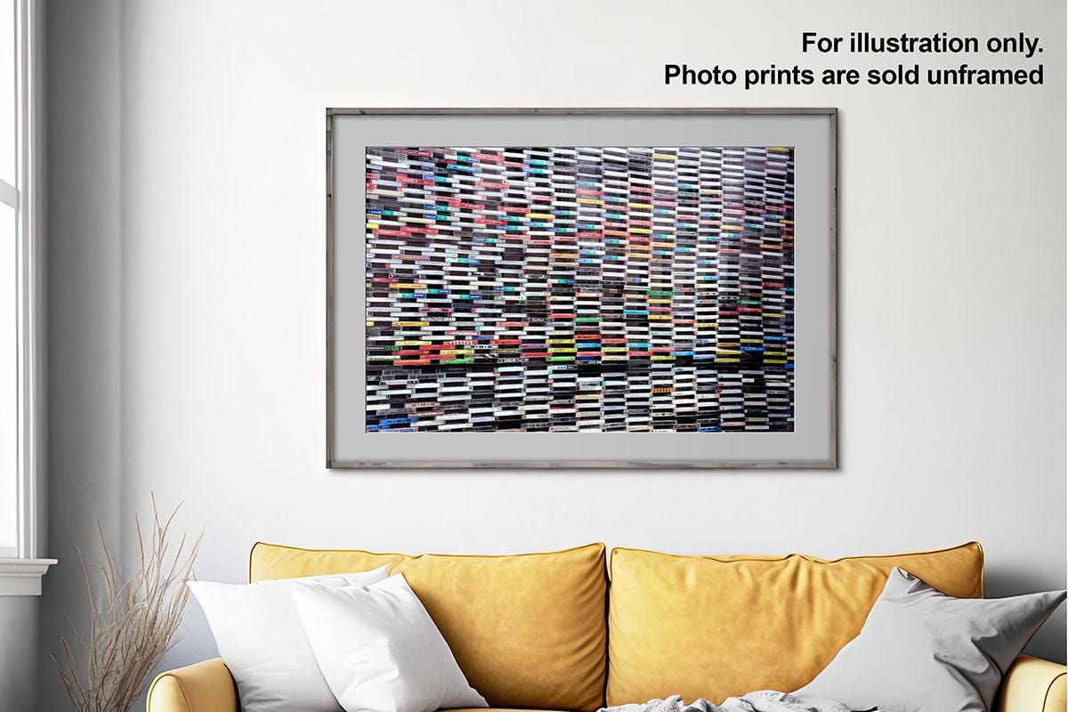 Wall of Sound cassette tapes wall art in frame in living room with text overlay
