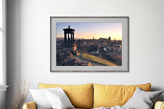 Edinburgh Calton Hill Cityscape in frame on wall above yellow couch