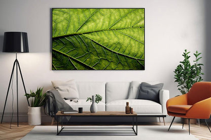 Green leaf macro photo wall art in frame in living room 