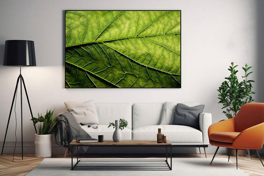 Green leaf macro photo wall art in frame in living room 