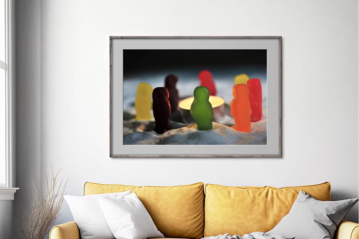 Jelly babies in frame on living room wall